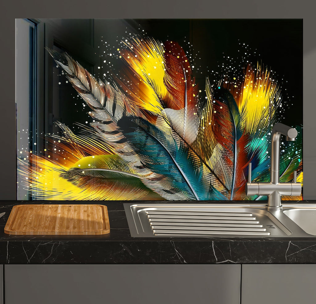 a kitchen sink with a painting of feathers on it