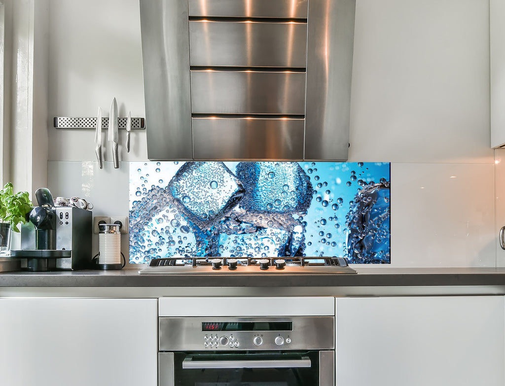 a kitchen with a stainless steel stove top oven