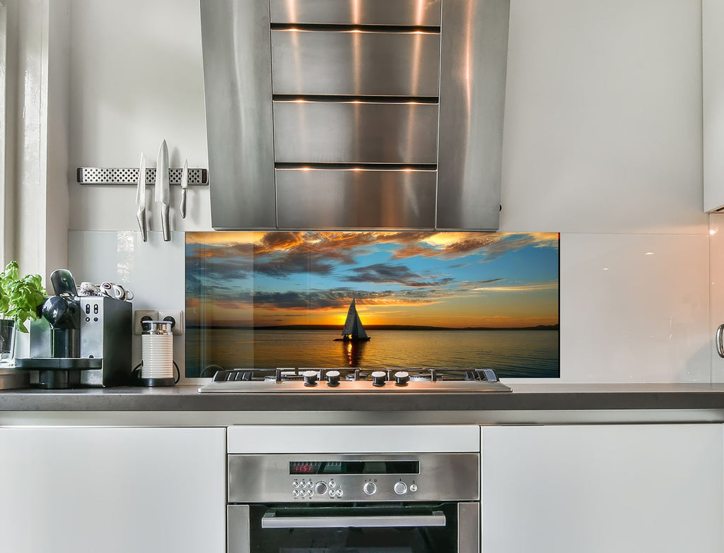 a kitchen with a stainless steel stove top oven