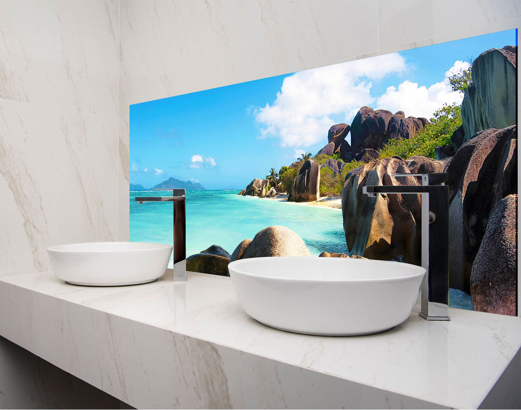 two white bowls on a counter in a bathroom