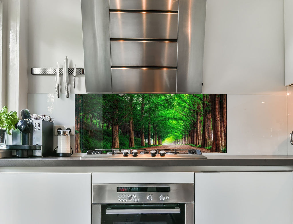 a stove top oven sitting inside of a kitchen