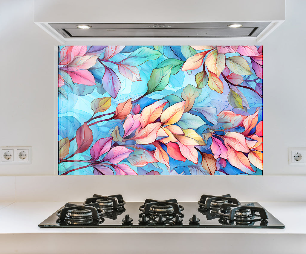 a painting of colorful leaves on a wall above a stove