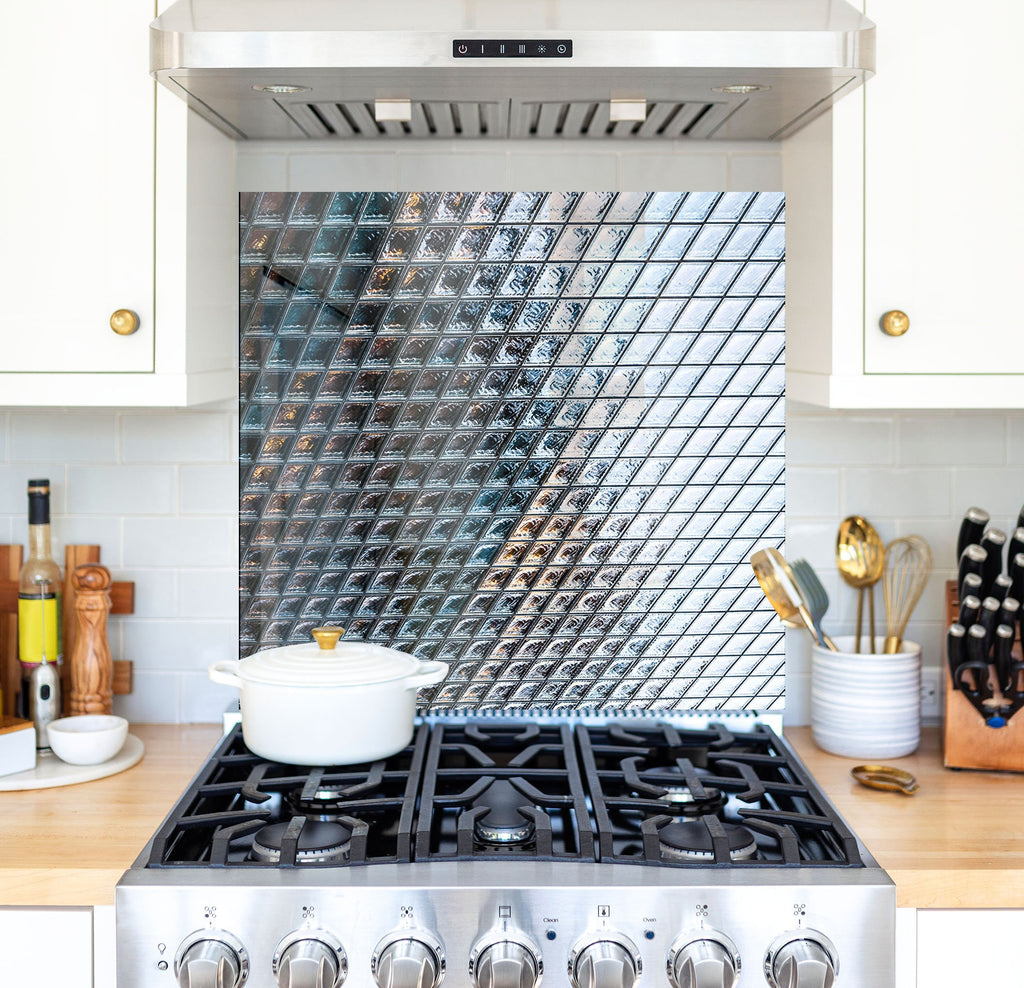 a stove top oven sitting inside of a kitchen