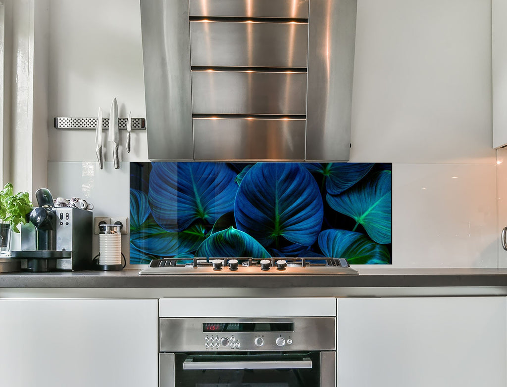 a kitchen with a stainless steel stove top oven