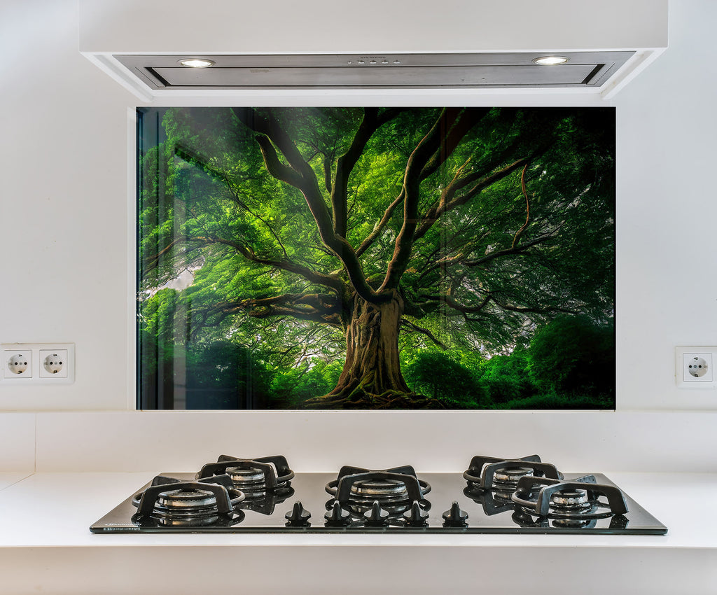 a picture of a tree on a wall above a stove