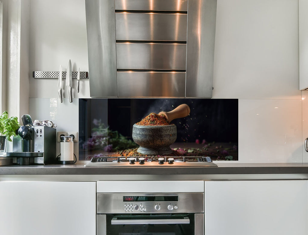 a stove top oven sitting inside of a kitchen