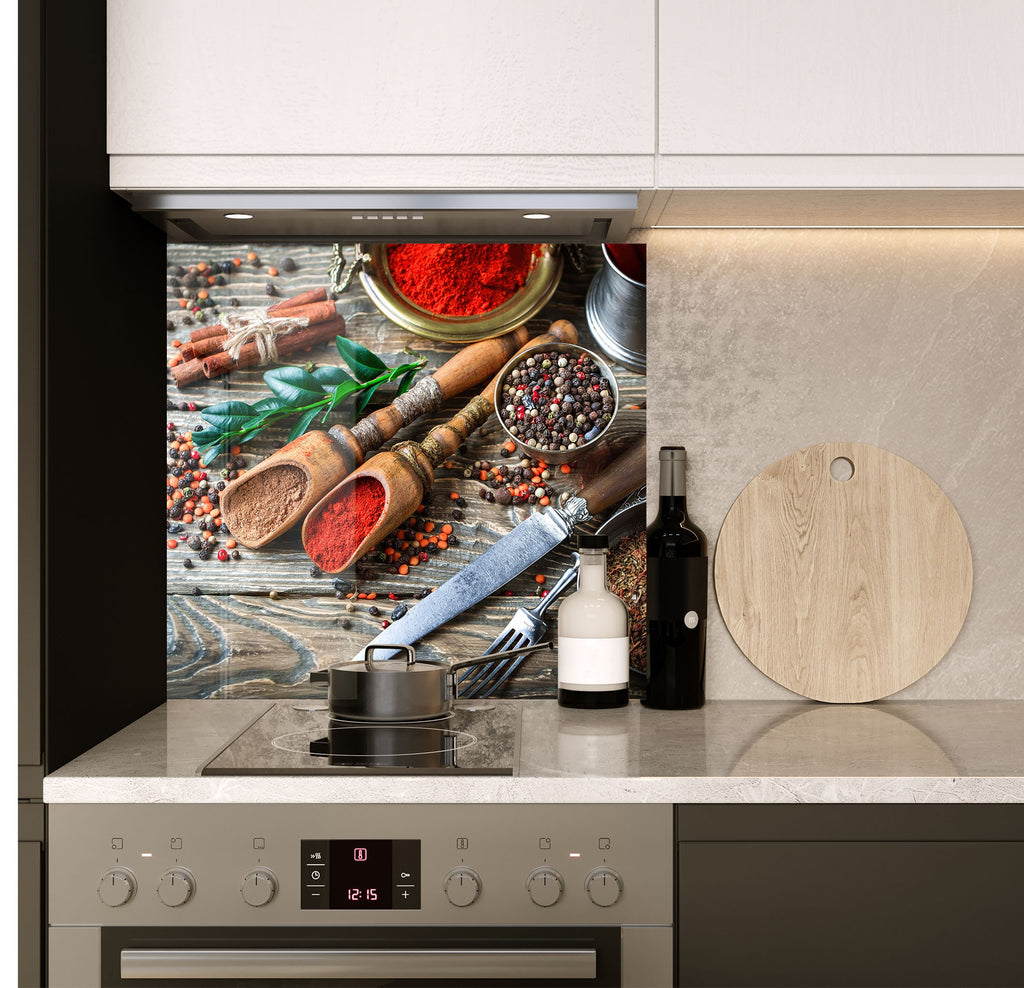 a kitchen counter with spices and a cutting board