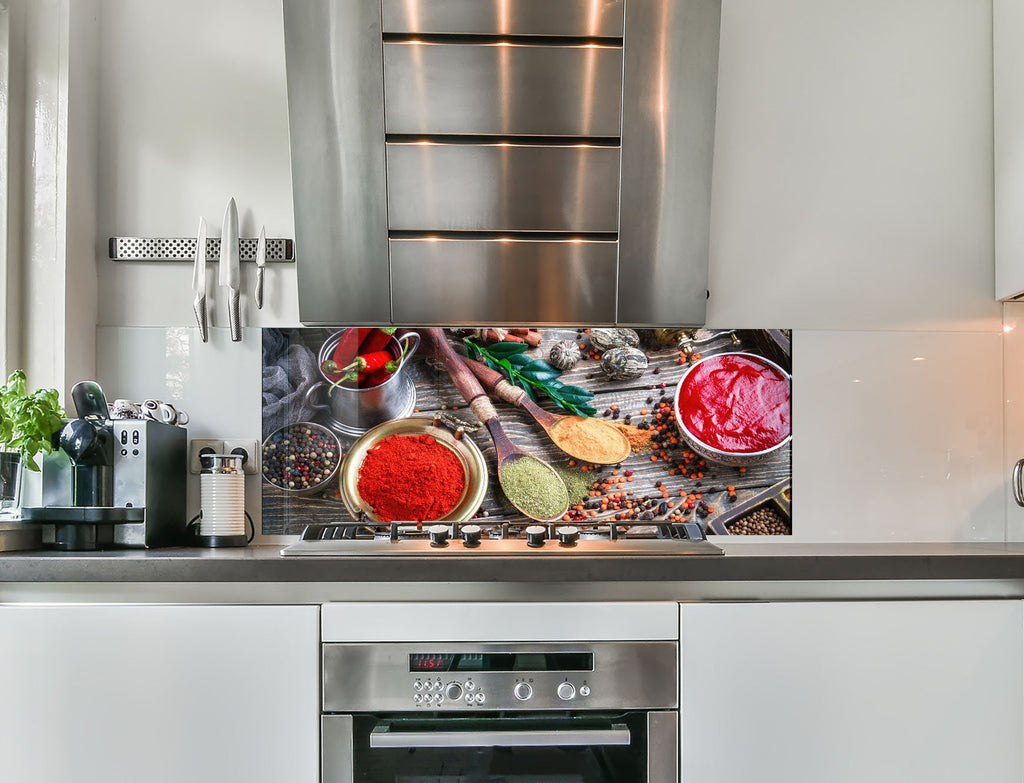 a kitchen with a stainless steel stove top oven