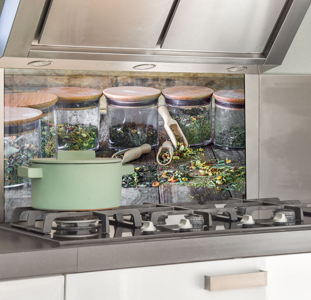 a stove top oven sitting inside of a kitchen