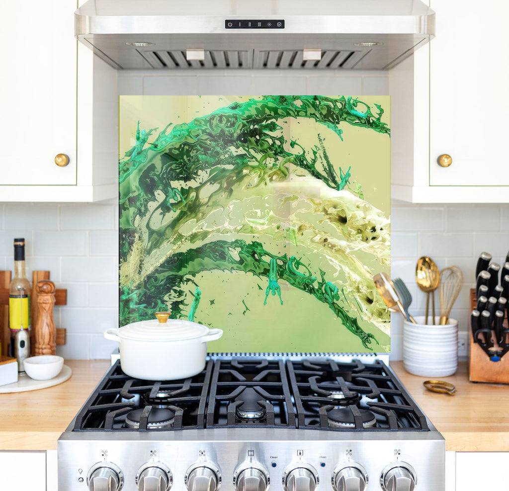 a stove top oven sitting under a painting