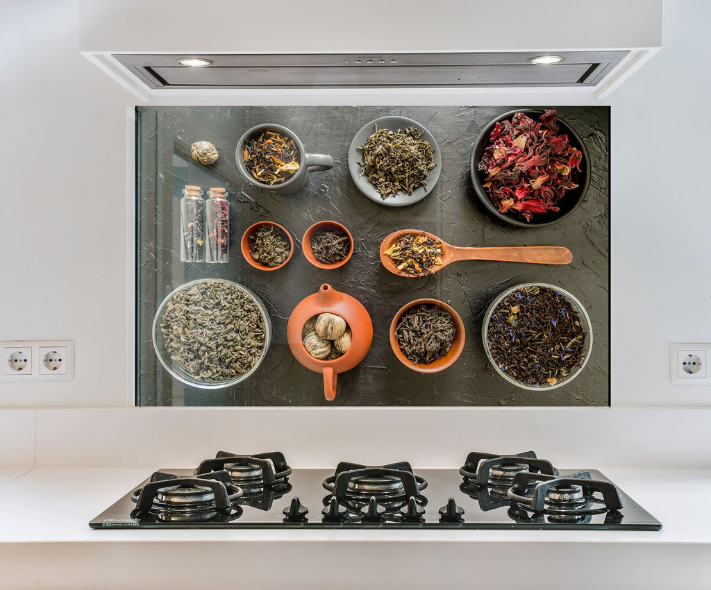 a stove top with bowls of food on top of it