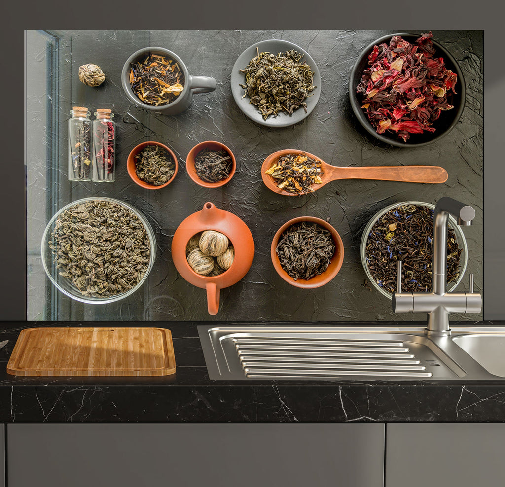 a kitchen counter topped with bowls of food