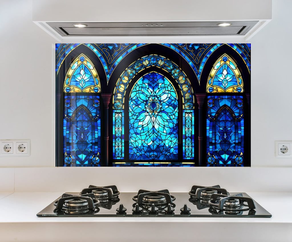 a kitchen with a stove top and a stained glass window