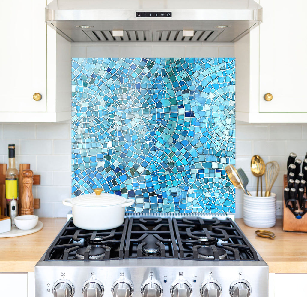 a stove top oven sitting inside of a kitchen