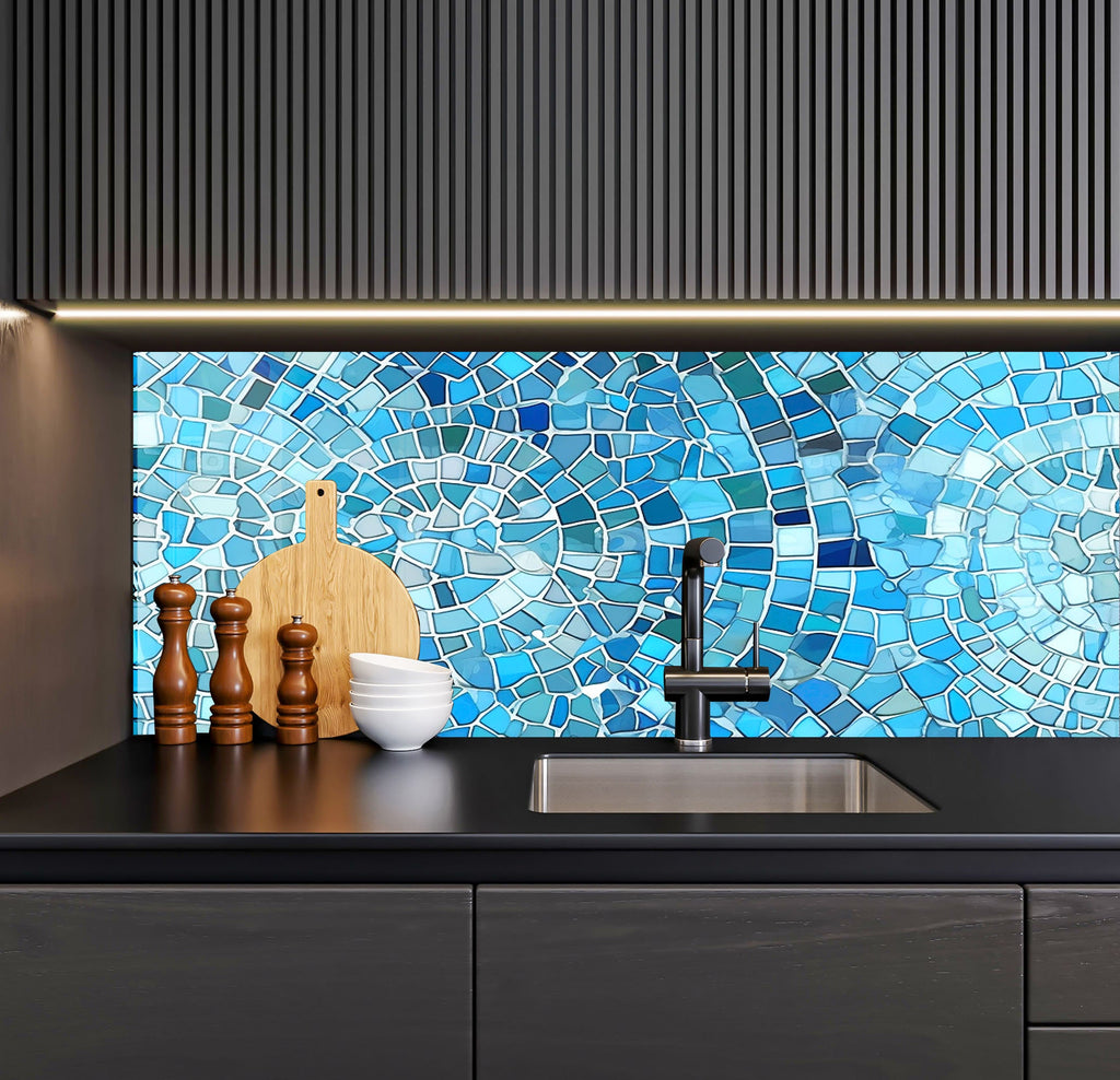 a kitchen with a sink and a blue mosaic tile backsplash