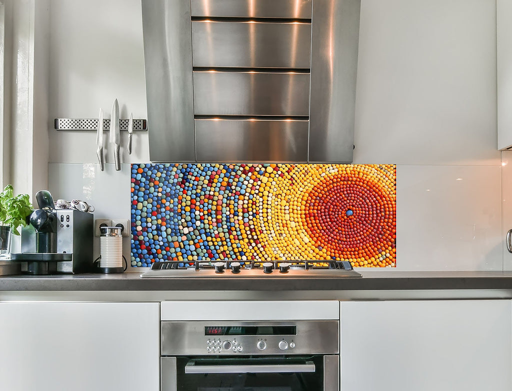 a kitchen with a stove top oven and a painting on the wall