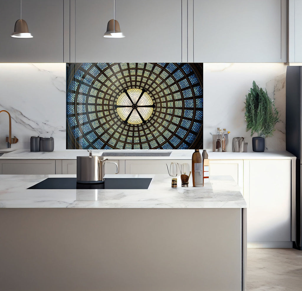 a kitchen with a marble counter top and a painting on the wall