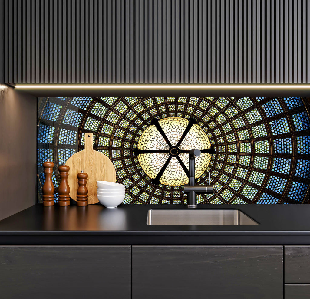 a kitchen counter with a sink and a clock on the wall