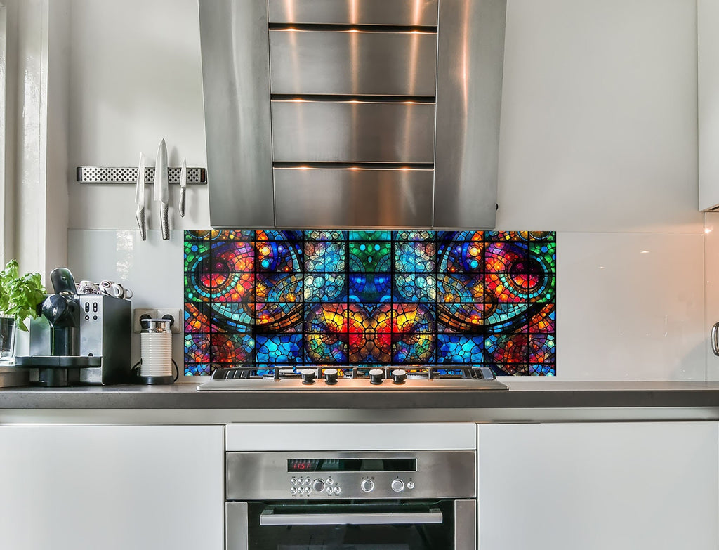 a kitchen with a stove top oven and a large stained glass window