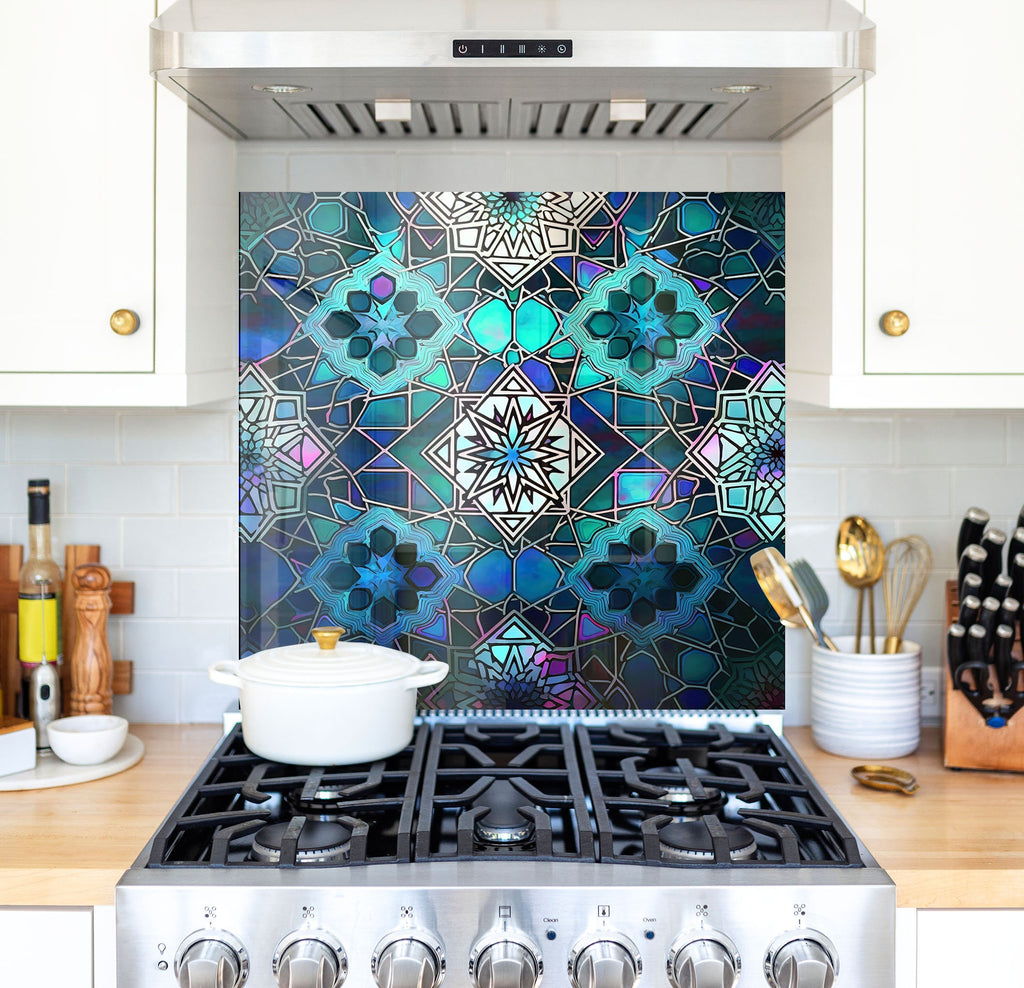 a stove top oven sitting inside of a kitchen